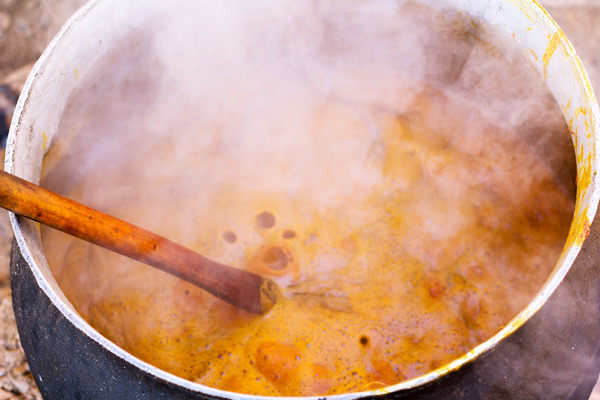 Boiling the strained palm oil